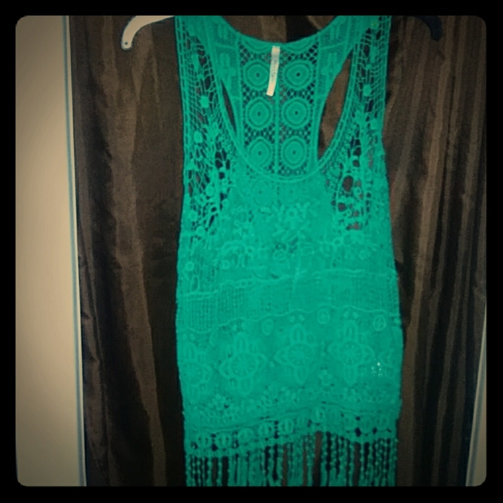 A teal embroider shirt